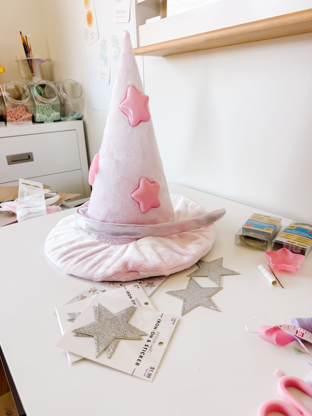 Step 18: Add the stars to the hat