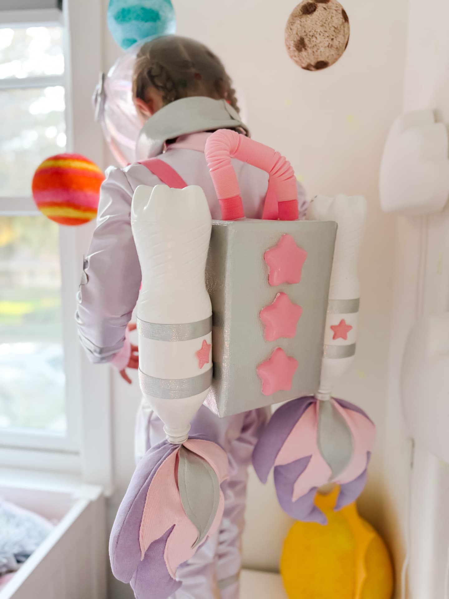 Rear view of the handmade rocket jetpack strapped to the costume
